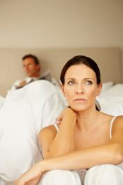 woman upset bedroom