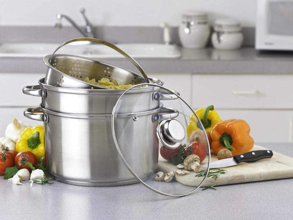 Pasta, vegetable multi-cooker on kitchen counter