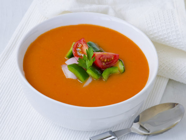 Spanish Cuisine. Gazpacho. Andalusian cold soup served in a ceramic bowl. Taken in daylight.