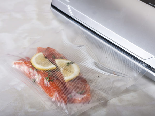 Salmon fillets in a vacuum package. Sous-vide, new technology cuisine