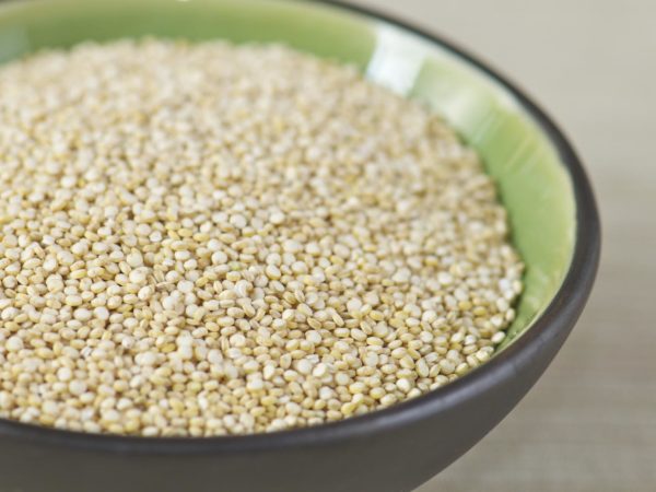 Close-up Black Bowl of Uncooked Quinoa