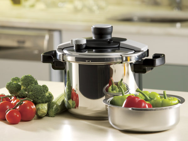 pressure cooker and vegetables in the kitchen