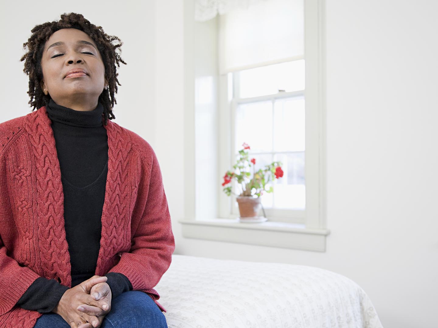 one woman with her eyes closed