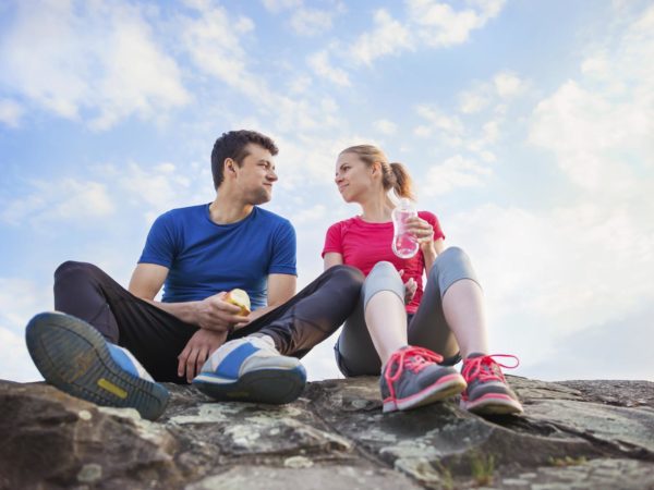 Young runners in nature taking a break