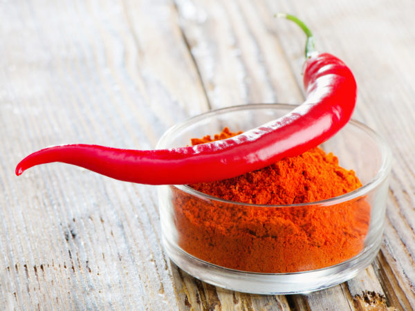 Red pepper  on wooden table