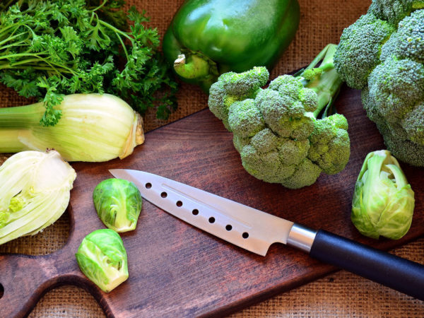 Broccoli, Brussels sprouts, bell pepper, fennel seed and knife