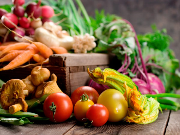 A selection of fresh organic vegetables on display.  Very shallow dof