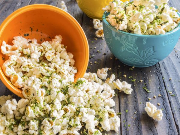 Popcorn sprinkled with furikake, a japanese seasoning made of sesame seeds, salt, sugar and seaweed, common in Hawaii