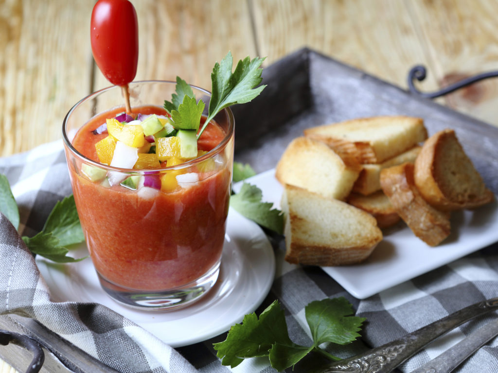 gazpacho with Toast on a tray, food close up