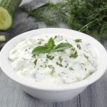 tzatziki cucumber with yogurt on gray background