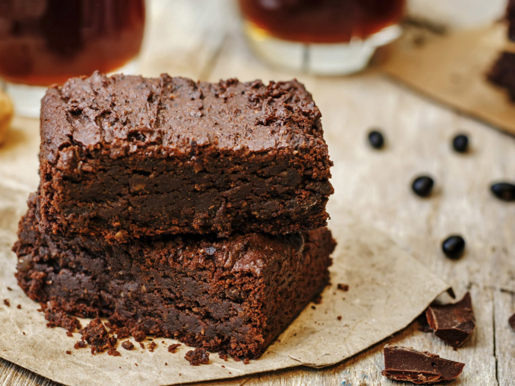 black bean brownies on a dark wood background. the toning. selective focus