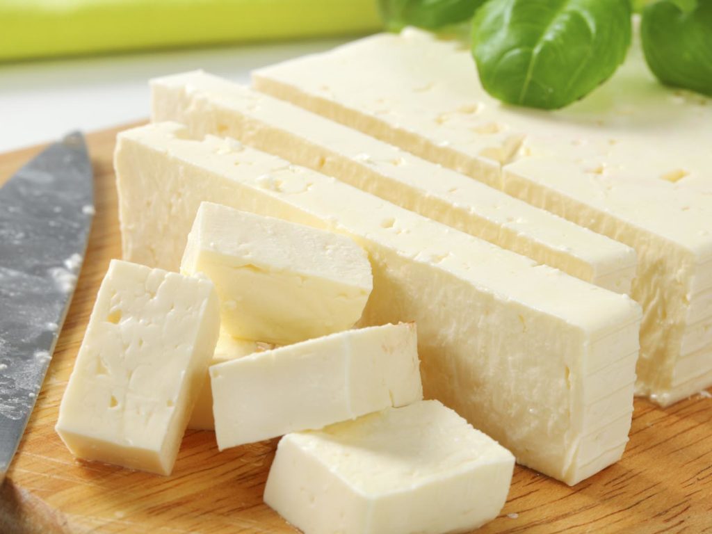 Slices of tofu cheese with fresh radish
