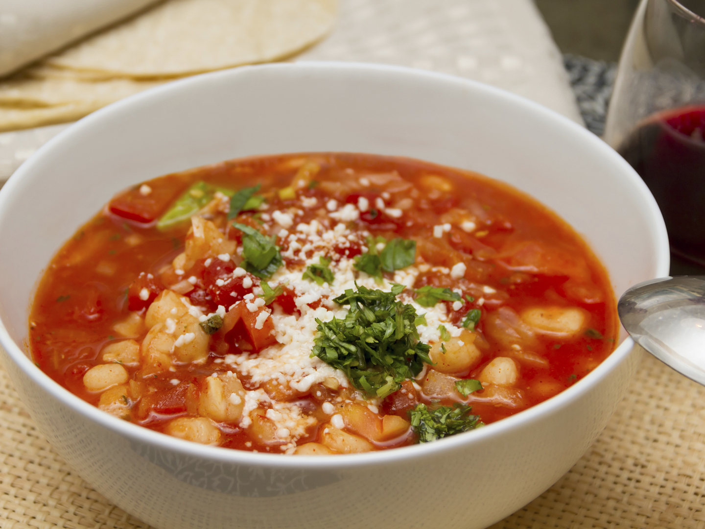 Fresh mexican tomato soup with corns and vegetables