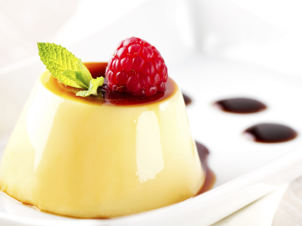 Creme caramel with raspberries