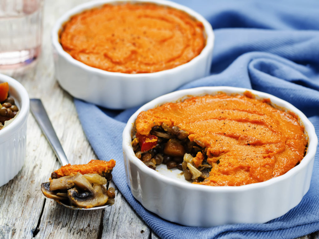 vegan green lentil mushroom sweet potato Shepherds pie. toning. selective focus