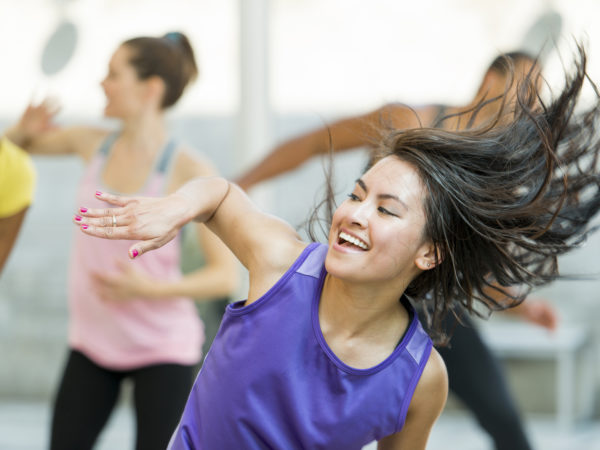 Group of dancers dancing at studio