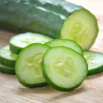 Fresh Cucumber  slices on wood background