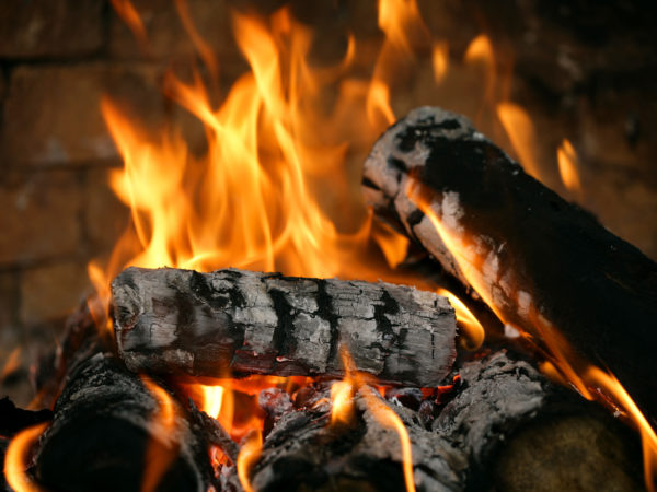 Close-up of real fire in a fireplace.