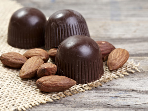 Tree Dark chocolates with almonds, close-up