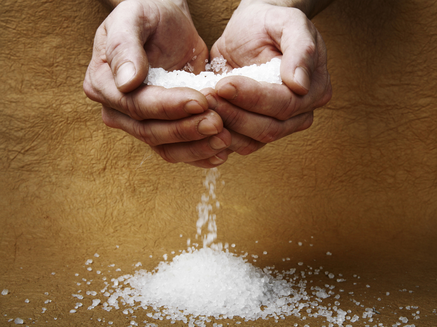 Man hands holding salt.