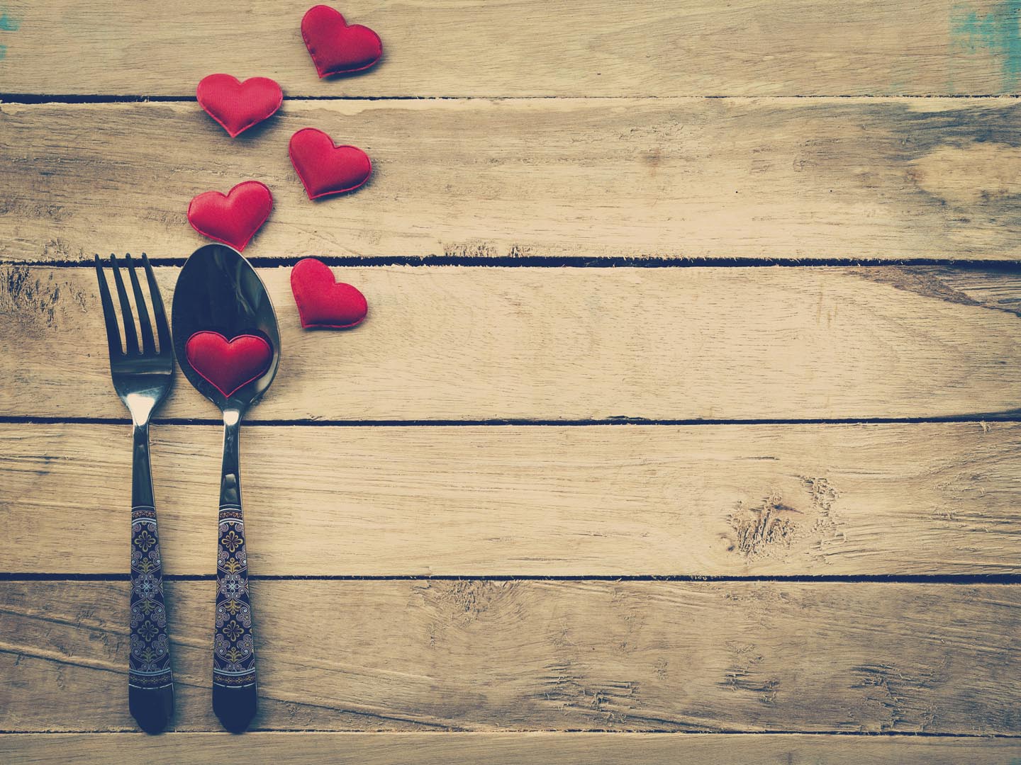 Valentines day dinner with table setting in rustic wood