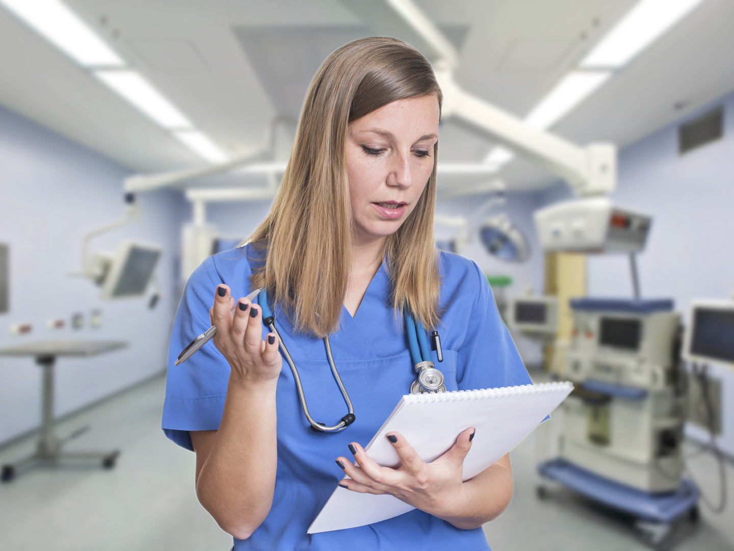 Shocked woman doctor reading her clipboard