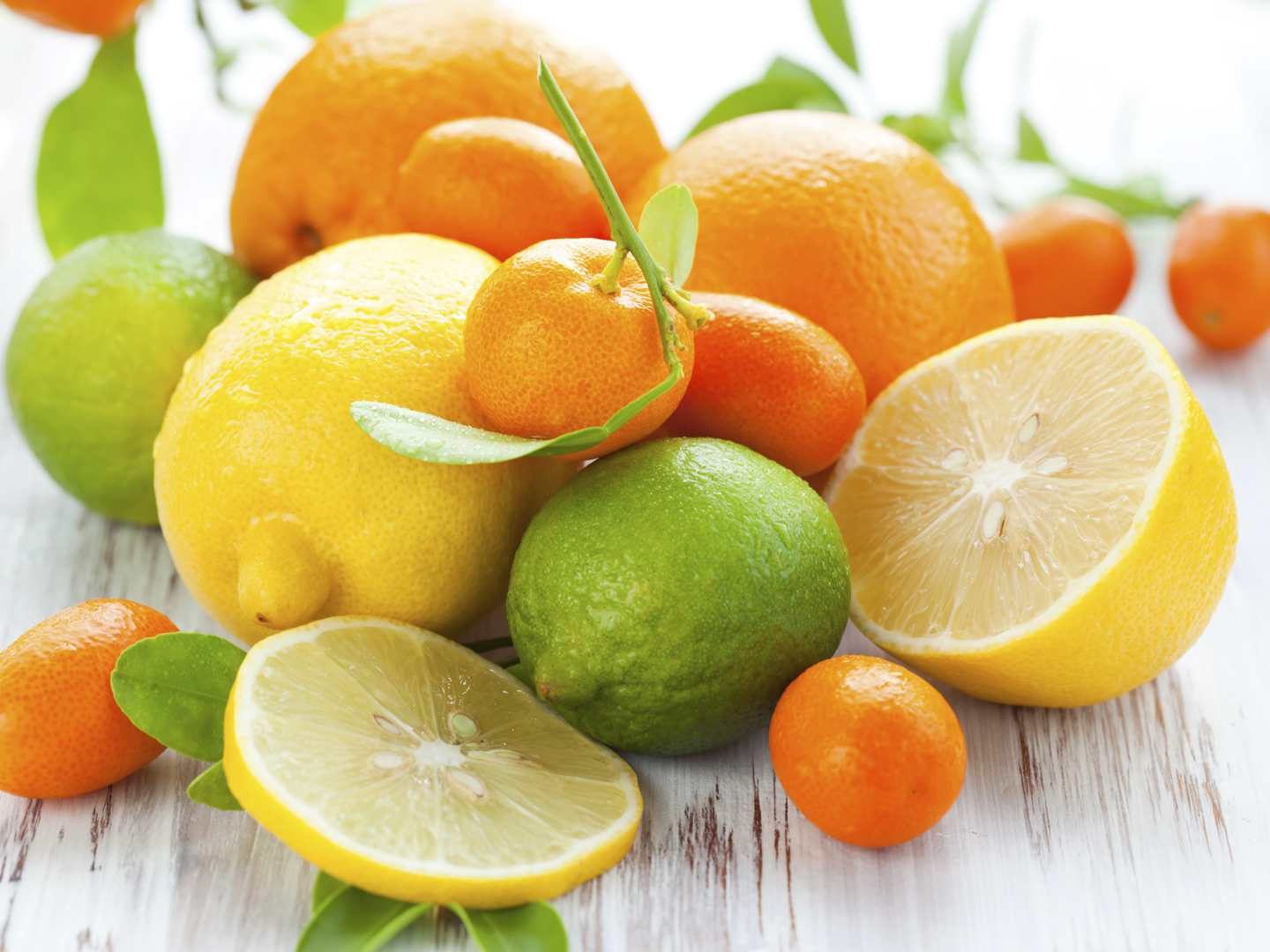 Citrus fresh fruit on the white wooden table