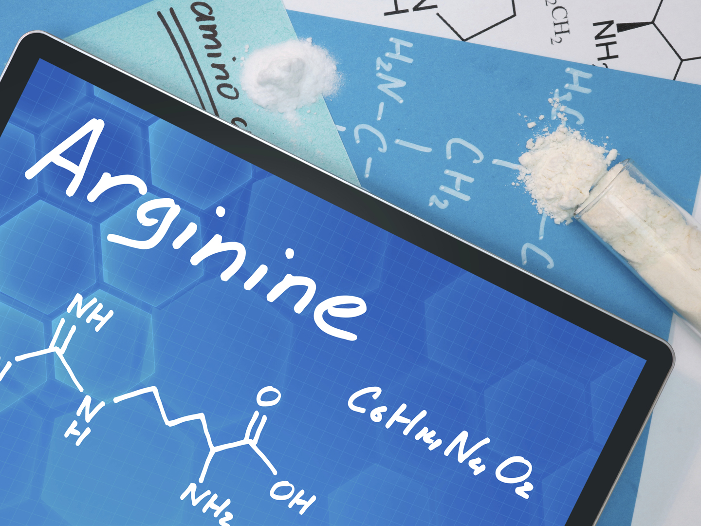 Tablet with the chemical formula of  Arginine . Amino acids.