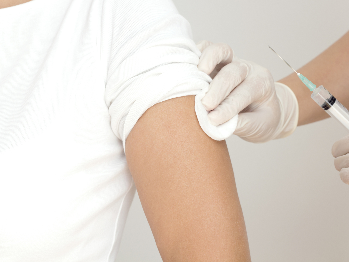 Nurse makes vaccination of patient in a clinic, horizontal