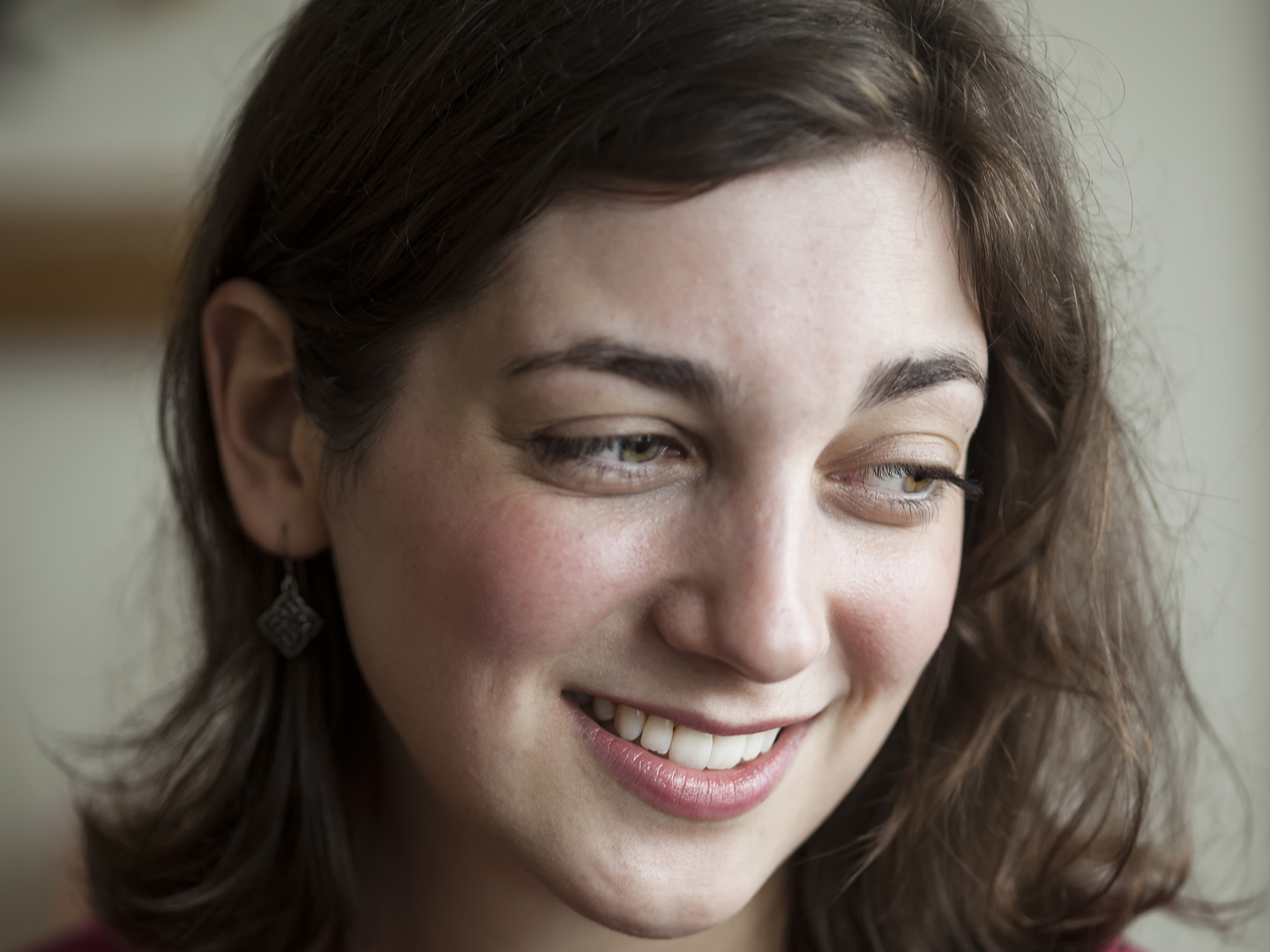 Portrait of a young woman looking away from the camera