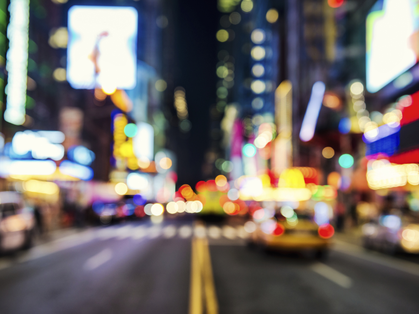 Blurred street illumination and night lights of New York City