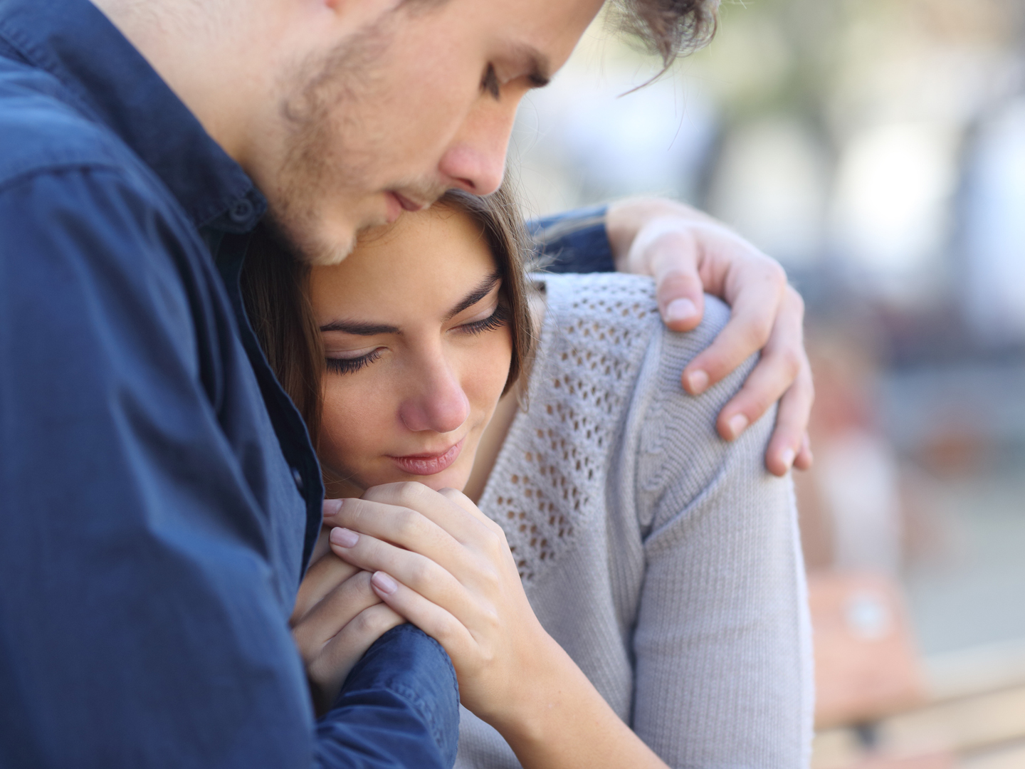 Manage Stress - Man comforting friend