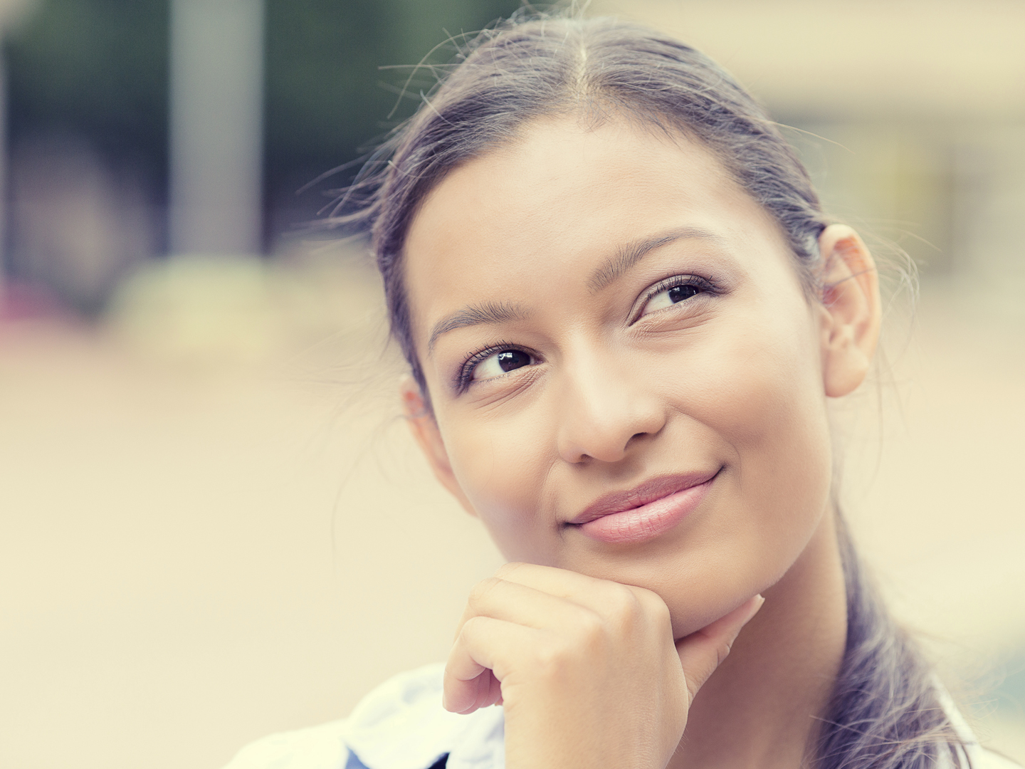 Closeup headshot portrait charming smiling joyful happy business woman looking upwards daydreaming nice future thinking isolated outside background. Positive emotion facial expression feelings