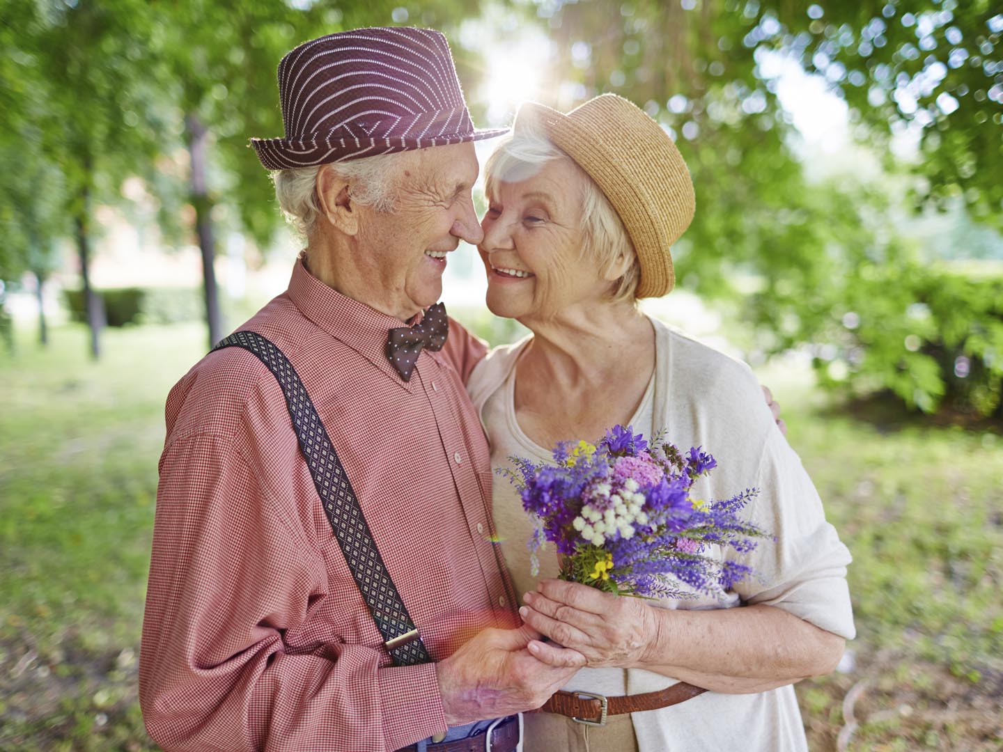 Happy elderly couple in love enjoying summer day together