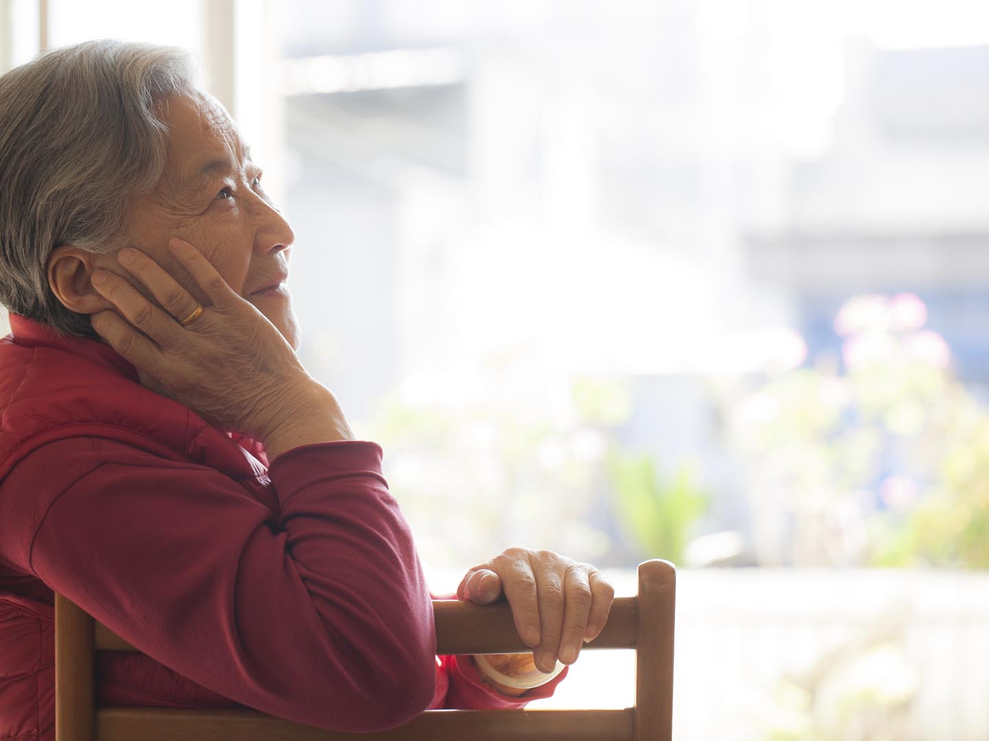 Portrait of a smiling senior woman of East Asian ethnicity