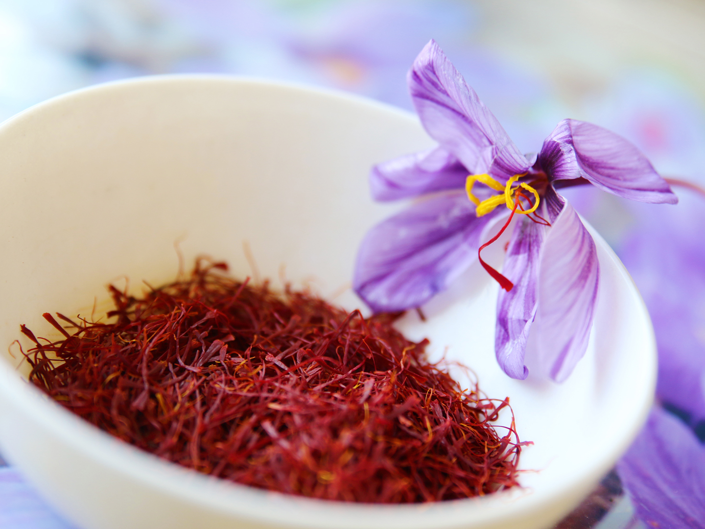 Commercial saffron comes from the bright red stigmas of the saffron crocus (Crocus sativus) which flowers in the Fall in many different countries, including Greece, India, Iran, Afghanistan and Spain.