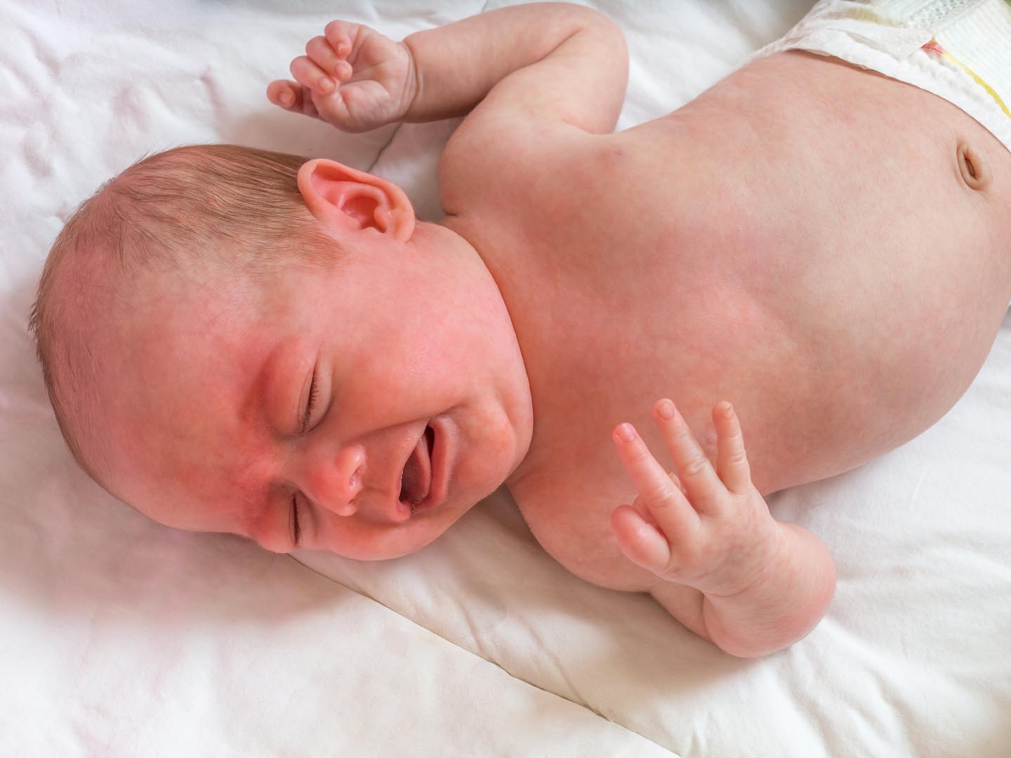 Baby or newborn is crying and suffers from colic