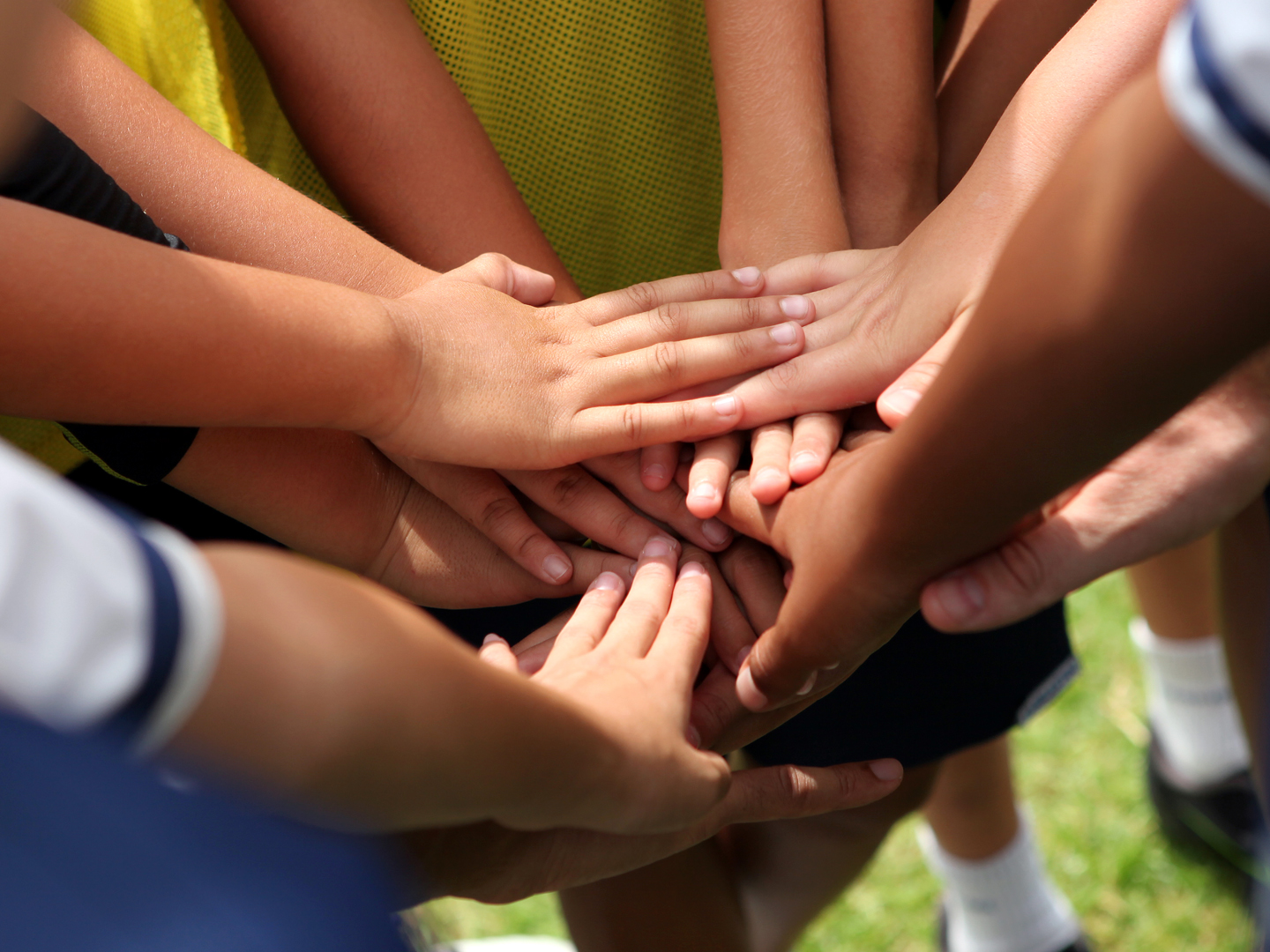 group of young people&#039;s hands