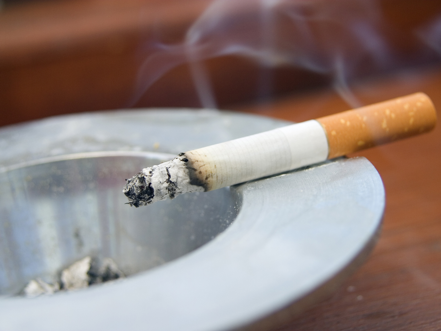 Burning cigarette smoking on ashtray---------------------Similar Images---------------------