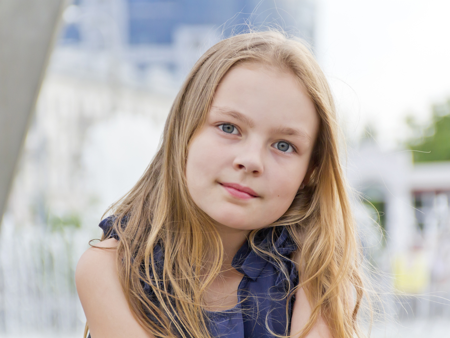 Portrait of cute girl with blond hair