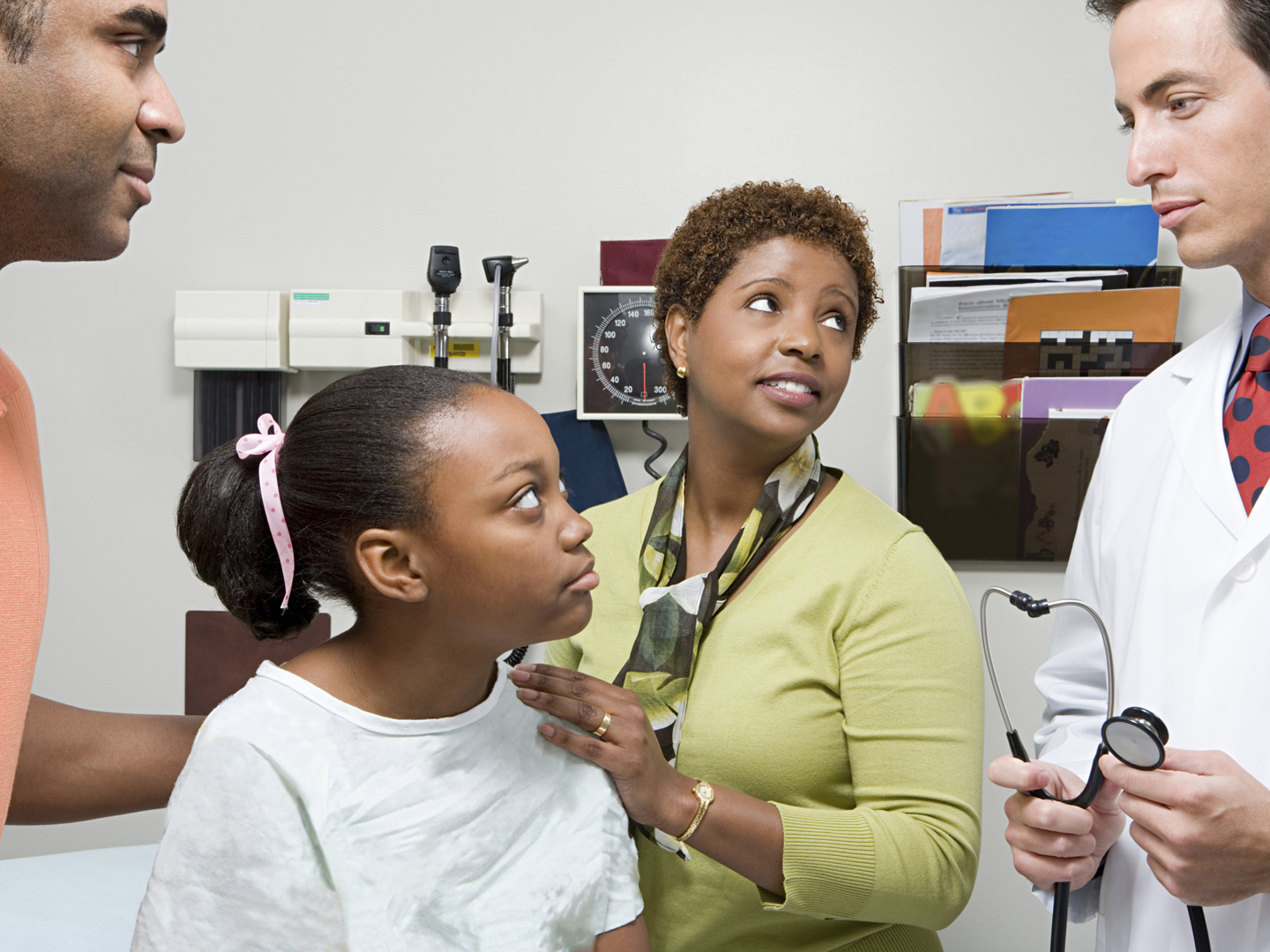 Family listening to doctor