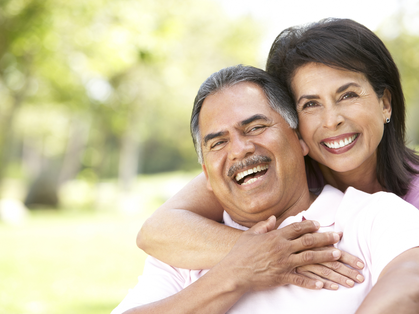 Portrait Of Senior Couple In Park