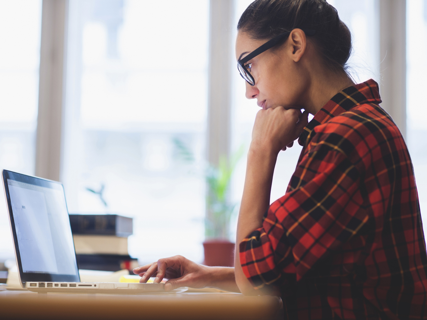 Young woman working on laptop