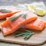 Raw salmon on the wooden board