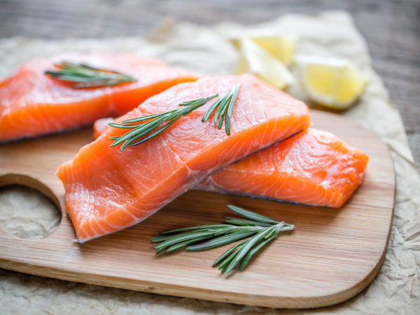 Raw salmon on the wooden board