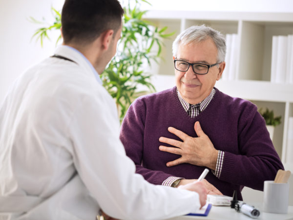 Sick old man visit doctor specialist about pains in breasts