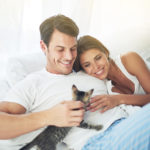 Cropped shot of a young couple relaxing with kitten in their bedroomhttp://195.154.178.81/DATA/i_collage/pi/shoots/783281.jpg