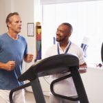 Patient Using Treadmill In Hospital Physiotherapy Department