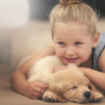 An adorable little girl with her puppy  at homehttp://195.154.178.81/DATA/i_collage/pi/shoots/783492.jpg