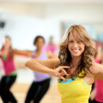 A fitness dance group class at the gym